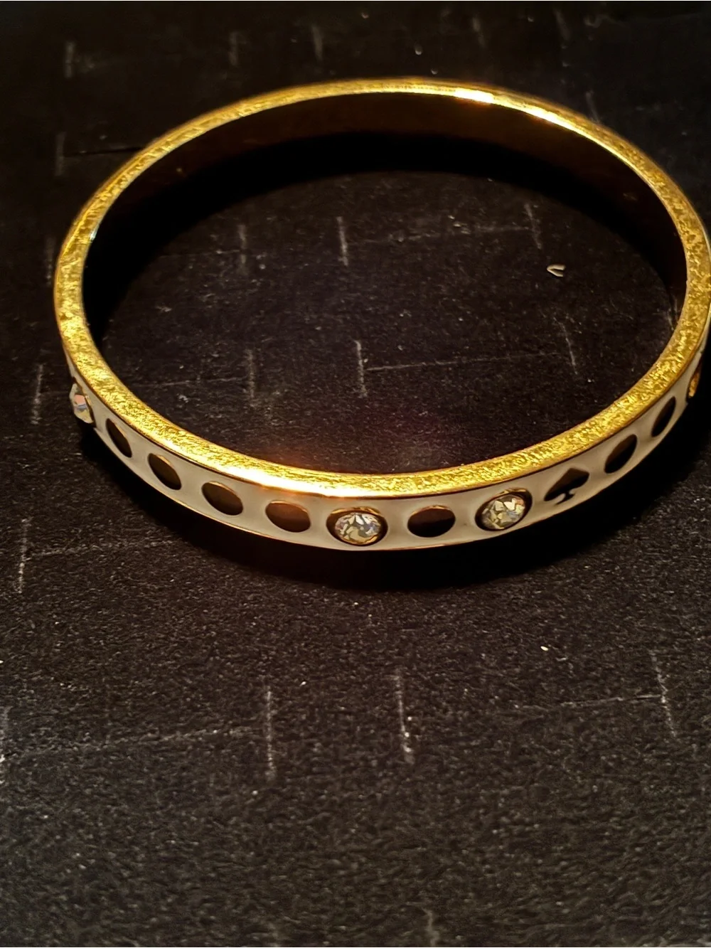 Kate Spade Gold-Tone White Enamel Bangle with Crystal Accents - Picture 5 of 5